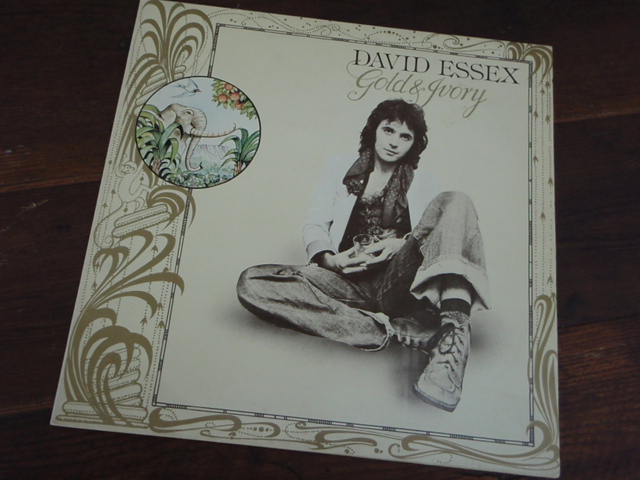 ESSEX DAVID. gold & ivory.