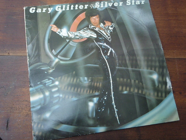 GLITTER GARY. silver star.