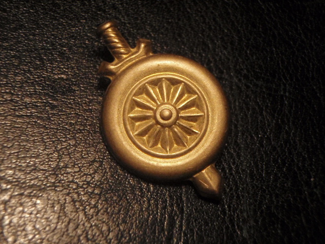 tunnukset.HUOLTORYKMENTIN erikoismerkki