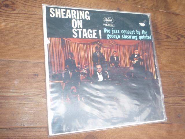 GEORGE SHEARING QUINTET. shearing on stage.
