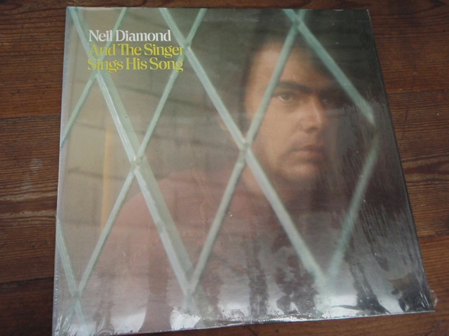 DIAMON NEIL.and the singer sings his song.