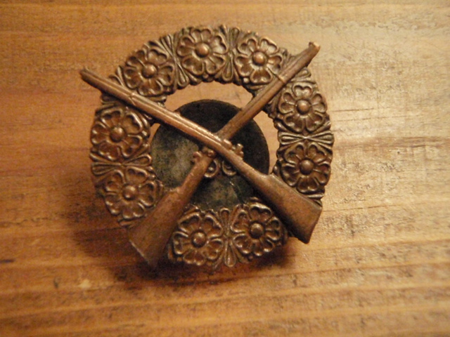 kuntoisuusmerkki. AMMUNTA III luokka.(opp,e,simula 82 p.)pronssi